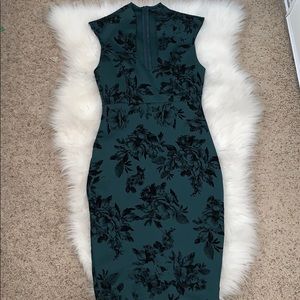Green bodycon dress.